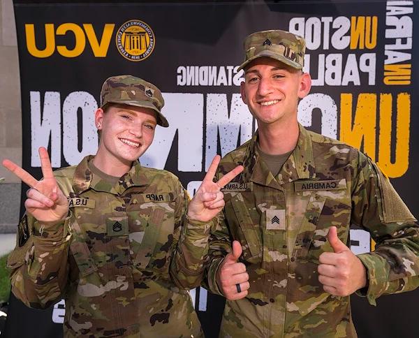 Two VCU students wearing camouflage uniforms
